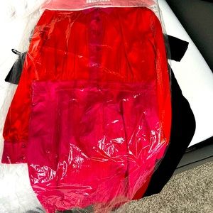 Orange and pink Bebe longsleeve dress